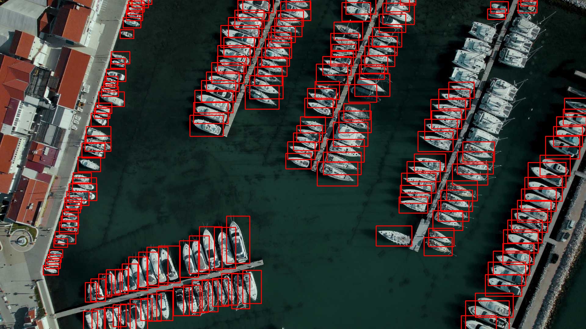 YOLO11-OBB detections rendered as axis-aligned boxes